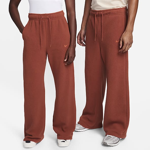 Orange nike tech pants discount